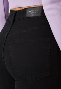Gina Tricot Petite HIGH WAIST - Uske traperice - black