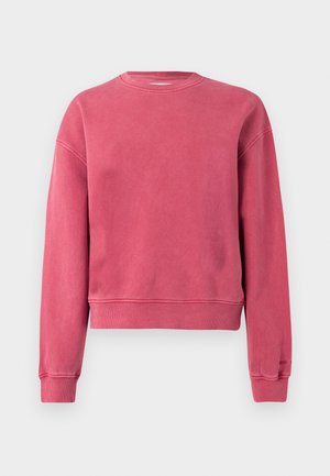 Orezaná ružová mikina s dlhými rukávmi, okrúhlym výstrihom a rebrovanými manžetami a lemom. Hladká textúra s mierne vyblednutým vzhľadom.