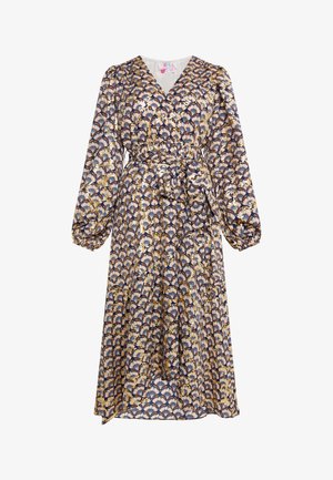 Mėlynos spalvos apynių su geometriniu gėlių raštu auksinės ir kreminės spalvų. Ilgos pūsto stiliaus rankovės ir audinio juostos pririšimui ties juosmeniu.