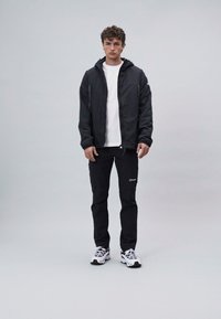 Berghaus TRAIL EXPLORER PANT - Āra bikses - black