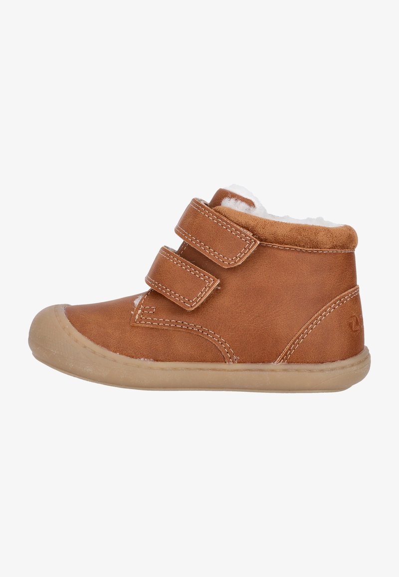 Brown leather ankle boots with two Velcro straps, soft interior lining, tan rubber sole, and stitched detailing on the upper.