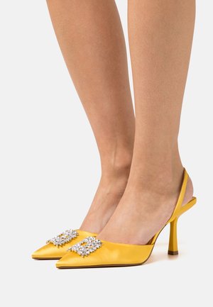 ALDO Pumps - yellow