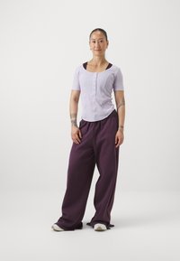 Champion EMOTIONAL DANCE WIDE LEG PANTS - Treniņtērpa apakšdaļas - purple
