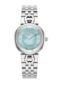 Silverfärgad metallklocka med rund urtavla, ljusblå pärlemor-urtavla, romerska siffror och diamantsmyckade markörer. Utrustad med en länkad armband.