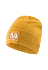 Bonnet en tricot jaune avec un revers, arborant une étiquette de marque carrée avec des lettres blanches sur un fond beige. Texture douce.