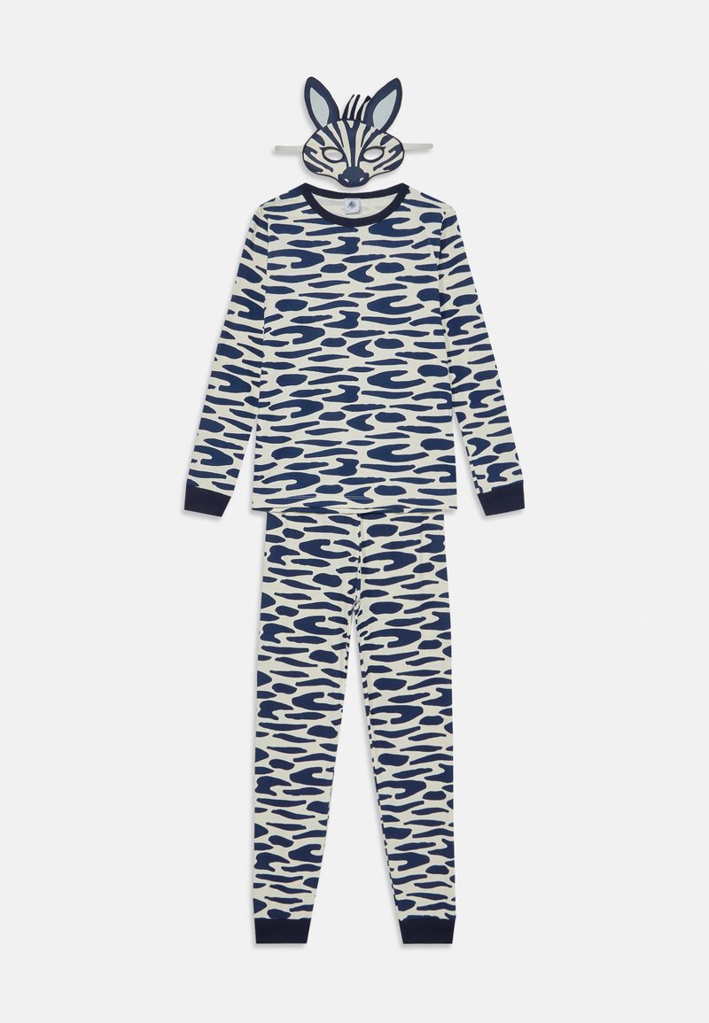 Conjunto de pijama para niños con mangas largas y pantalones en color crema con un patrón abstracto de olas en azul marino; incluye una máscara que imita características de animales.