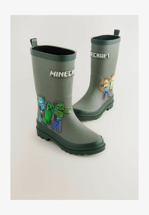 Zielone wodoodporne gumowe kalosze z logo Minecraft i pikselowymi grafikami postaci. Teksturowane podeszwy dla lepszej przyczepności oraz pętle do łatwego zakładania.