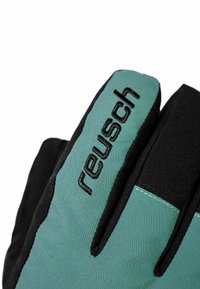 Türkise und schwarze Handschuhe aus strukturiertem Material, mit dem in schwarzen stickierten Buchstaben auf dem türkisen Abschnitt befindlichen "reusch"-Logo.