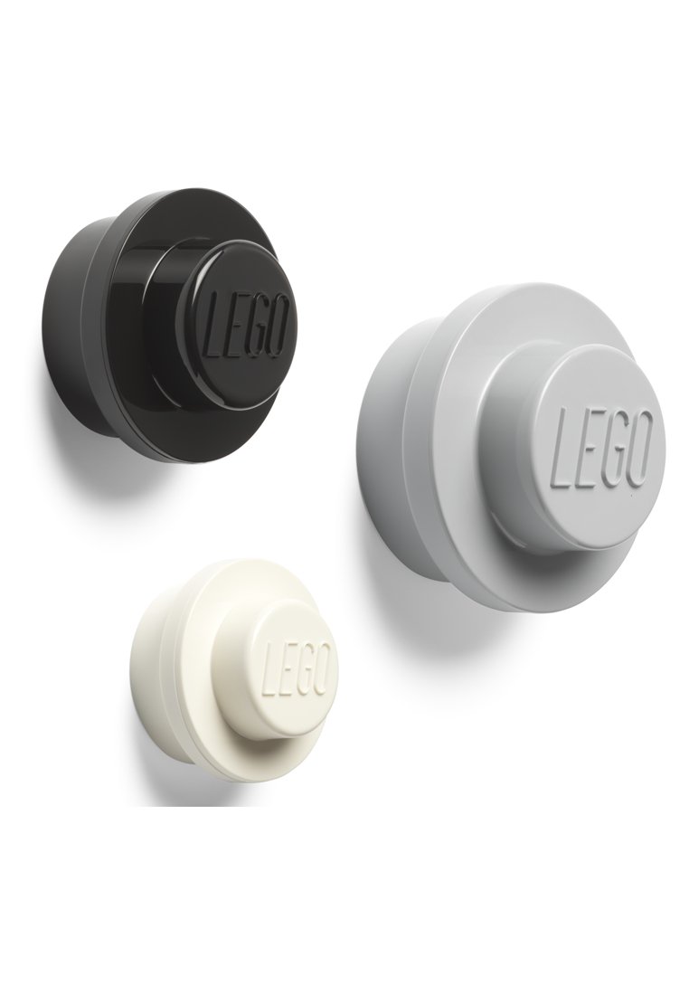 Set van drie ronde LEGO-stukken: zwart, lichtgrijs en off-white. Elk heeft een verhoogd LEGO-logo op een glad, glanzend oppervlak.