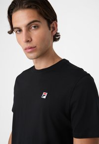 Fila BIELLA REGULAR - T-shirt - bas - black