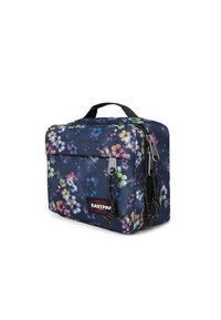 Tkaninová taška s květinovým vzorem v tmavě modré barvě, s horním uchopem, zipem a vnější kapsou. Obsahuje logo Eastpak a texturované detaily.