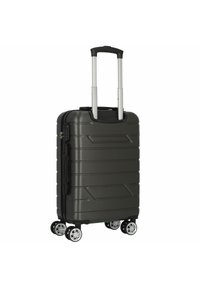 Harde koffer in donkergrijs, met een geribbelde design, uitschuifbare aluminium handgreep en vier multidirectionele wielen voor mobiliteit.