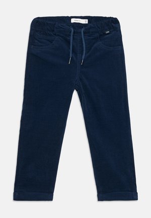 Mørkeblå corduroy bukser til småbørn med elastisk talje, snorelukning, for- og baglommer samt opsmøg ved kanten, størrelse 2-3 år.