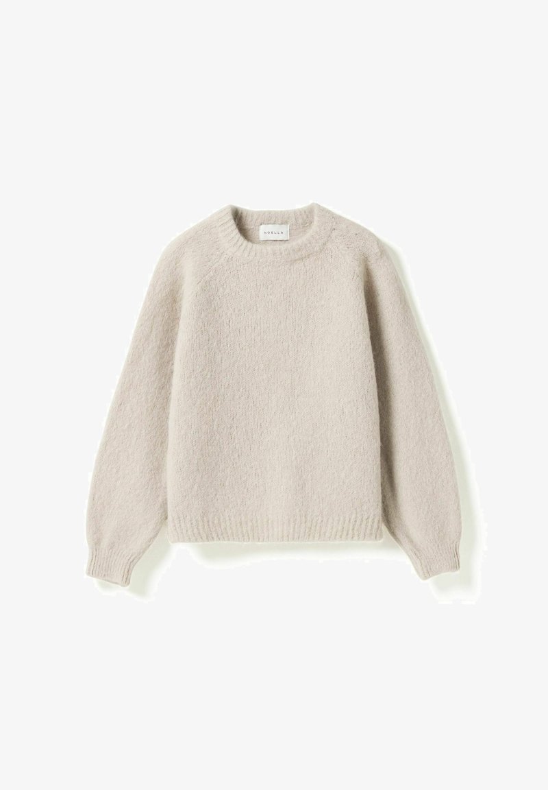 Light beige soft knit crewneck sweater with long sleeves and ribbed cuffs and hem, displayed flat on a white background.
