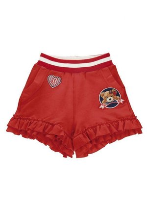 Shorts rouges pour enfants avec ourlets à volants, ceinture élastique rayée, écusson cœur sur la poche gauche et écusson ourson sur la poche droite.