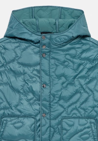 Padded teal jacket with a hood, featuring a quilted pattern, snap buttons, and two front pockets. Smooth, shiny fabric texture.