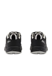 Black athletic shoes with textured mesh upper, reflective accents, padded collar, and a rubber sole designed for stability and traction.