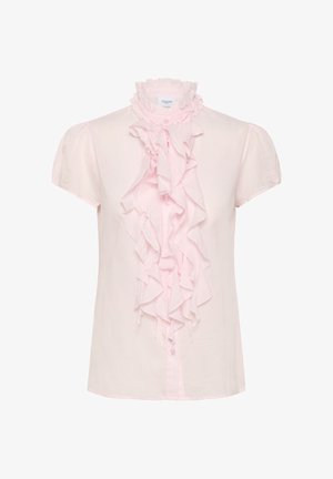 Bluza roz deschis cu mâneci scurte, cu volane pe partea din față, guler înalt cu volane și închidere cu nasturi. Confecționată dintr-un material neted și ușor.