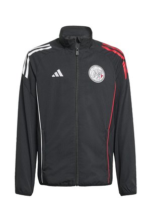 Schwarze Sportjacke mit Reißverschluss, weißen und roten Schulterstreifen, Teamlogo auf der Brust, Adidas-Logo vorne rechts, ohne Kapuze.