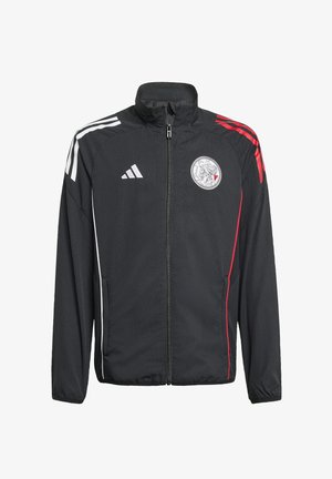 Czarna sportowa kurtka na zamek z białymi i czerwonymi paskami na ramionach, logo drużyny na piersi, logo Adidas po prawej stronie z przodu, bez kaptura.