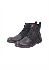 Botas de tobillo de cuero negro con acabado suave, diseño de cordones, acentos marrones, paneles texturizados y suelas de goma.