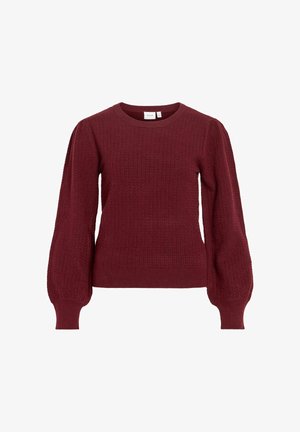 Vinrød strikket sweater med tekstureret mønster, rund halsudskæring og pufærmer med lange ærmer. Tæt siddende ved taljen med ribbet kant.