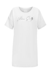 T-shirt bianca in cotone a maniche corte, con una stampa grafica nera che recita "Vitamin Sea" e un'icona di conchiglia sul frontale.