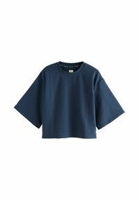 Mörkblå t-shirt med kort ärm i en strukturerad, ribbad tyg. Har en rund halsringning och en lös, boxig passform.