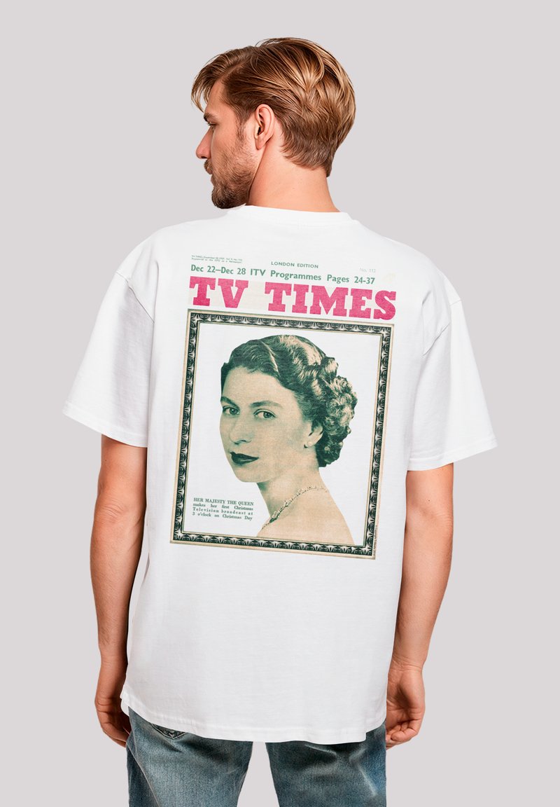 Weißes Baumwoll-T-Shirt mit einem Retro TV Times Grafikdruck auf der Rückseite, das eine Frau in einem dekorativen Rahmen mit Text zeigt.