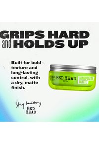 Green Bed Head Manipulator Matte hair product container with text describing bold texture, long-lasting control, and dry, matte finish.