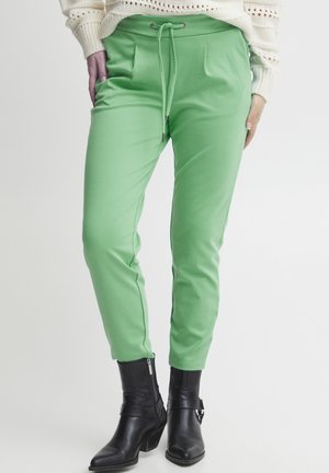 RIZETTA CROP PANTS - Pantalon de survêtement - ming green