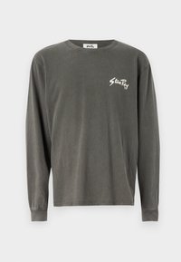 Unselected, washed black ink