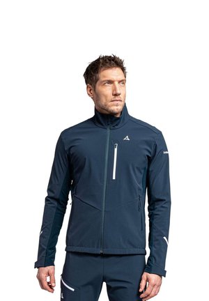 Dunkelblaue Softshell-Jacke mit hohem Kragen, einem mit Reißverschluss versehenen Brusttasche und kontrastierenden weißen Akzenten an den Ärmeln und dem Saum.