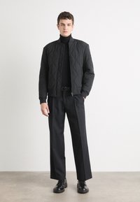 BOSS OSTRONG - Bomber stiliaus striukė - black