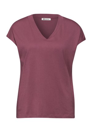 T-shirt femme mauve manches courtes à col en V, coupe décontractée avec une petite étiquette de marque à l'intérieur du col.