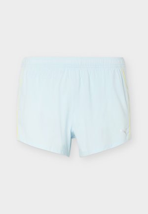 Light blue athletic shorts with elastic waistband, yellow side stripes, and small white Puma logo on the lower right leg.