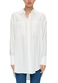 White long-sleeve button-up shirt with two front pockets, made of lightweight fabric, featuring a classic collar and a curved hemline.