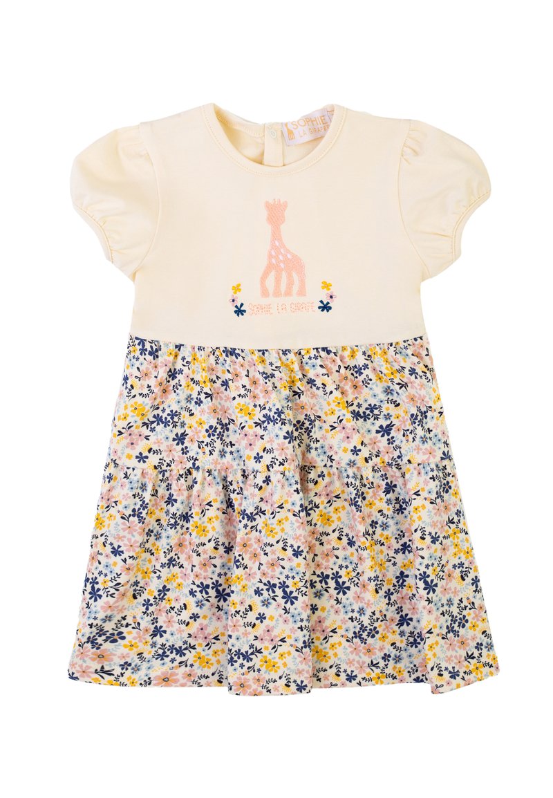 Abito crema a maniche corte con ricamo di giraffa e gonna a fantasia floreale nei toni del rosa, blu e giallo. Presenta un'apertura sul retro.