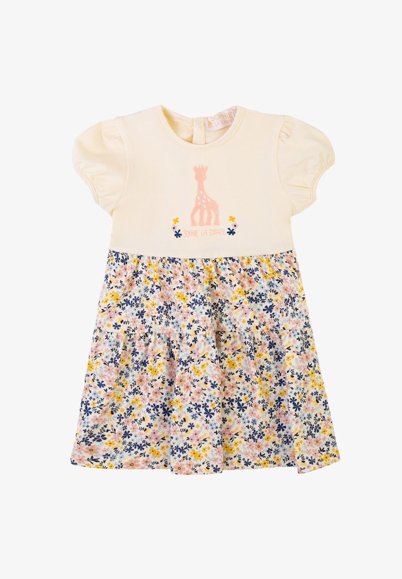 Abito crema a maniche corte con ricamo di giraffa e gonna a fantasia floreale nei toni del rosa, blu e giallo. Presenta un'apertura sul retro.