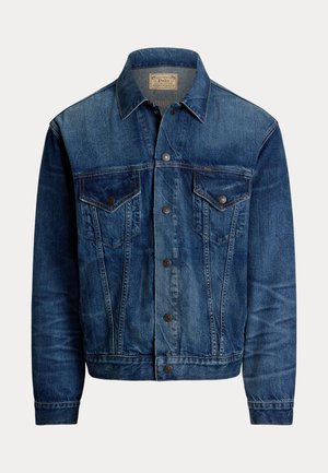 Veste en denim bleu foncé au design classique, dotée de deux poches poitrine, d'une fermeture à boutons et d'une texture légèrement délavée.