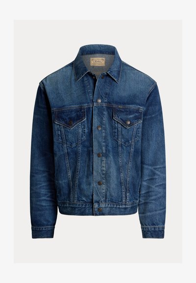 Jeansjakke i mørkeblå med et klassisk design, som har to brystlommer, knappestolpe og en lett falmet tekstur.