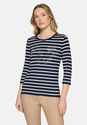 - Bluzka z długim rękawem