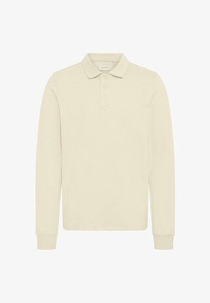 Tricou polo cu mâneci lungi, de culoare bej deschis, realizat din bumbac moale. Are guler clasic, nasturi pe partea din față și manșete cu refilet.