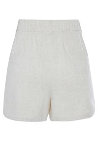 Beige linen blend women's shorts with an elastic waistband and side pockets, featuring a subtle textured fabric pattern.
