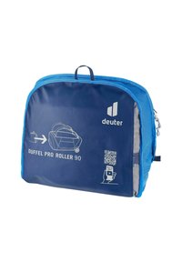Borsa a duffel blu con design con zip, caratterizzata da una grafica di una borsa imballata, istruzioni e un codice QR su uno sfondo blu scuro.