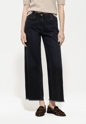 WIDE - Relaxed fit jeans - black