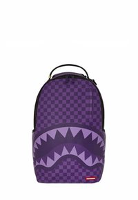 Zaino viola con motivo a scacchi e una grande grafica di denti. Ha una maniglia superiore e una chiusura con zip. Logo rosso nella parte inferiore.