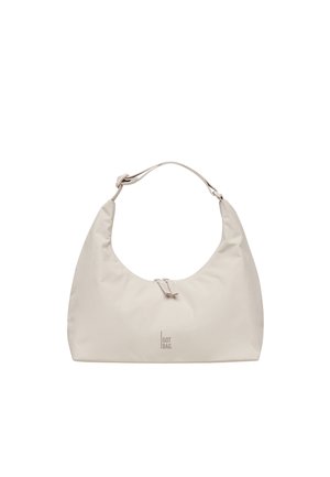 Sac à bandoulière beige en forme de croissant avec sangle ajustable, fermeture éclair, et logo « GOT BAG » centré en bas à l'avant.