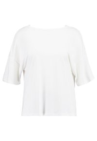 Bílý tričko s krátkým rukávem z měkké tkaniny. Má široký kulatý výstřih a uvolněný střih s viditelnými švy.