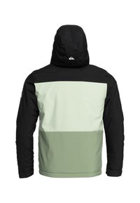 Huvtröja med en färgblocksdesign i svart, mintgrön och ljusgrå. Tillverkad av ett slätt och hållbart tyg för utomhusbruk.